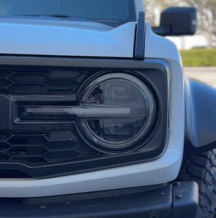 Ford Bronco 21-25 LED Projector Headlights w/ Ultra High Power LED High/Low Beams & White OLED DRL w/ Start-Up Lighting Sequence & Scanning Amber LED Turn Signals - Smoked Lens