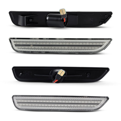 Two black car side mirrors with LED lights on a white background