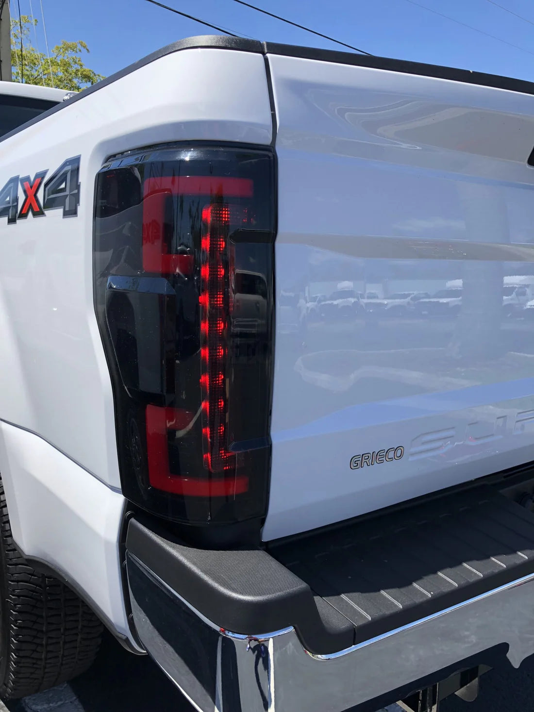 Ford Super Duty 17-19 (Replaces OEM LED) Tail Lights OLED in Dark Red Smoked