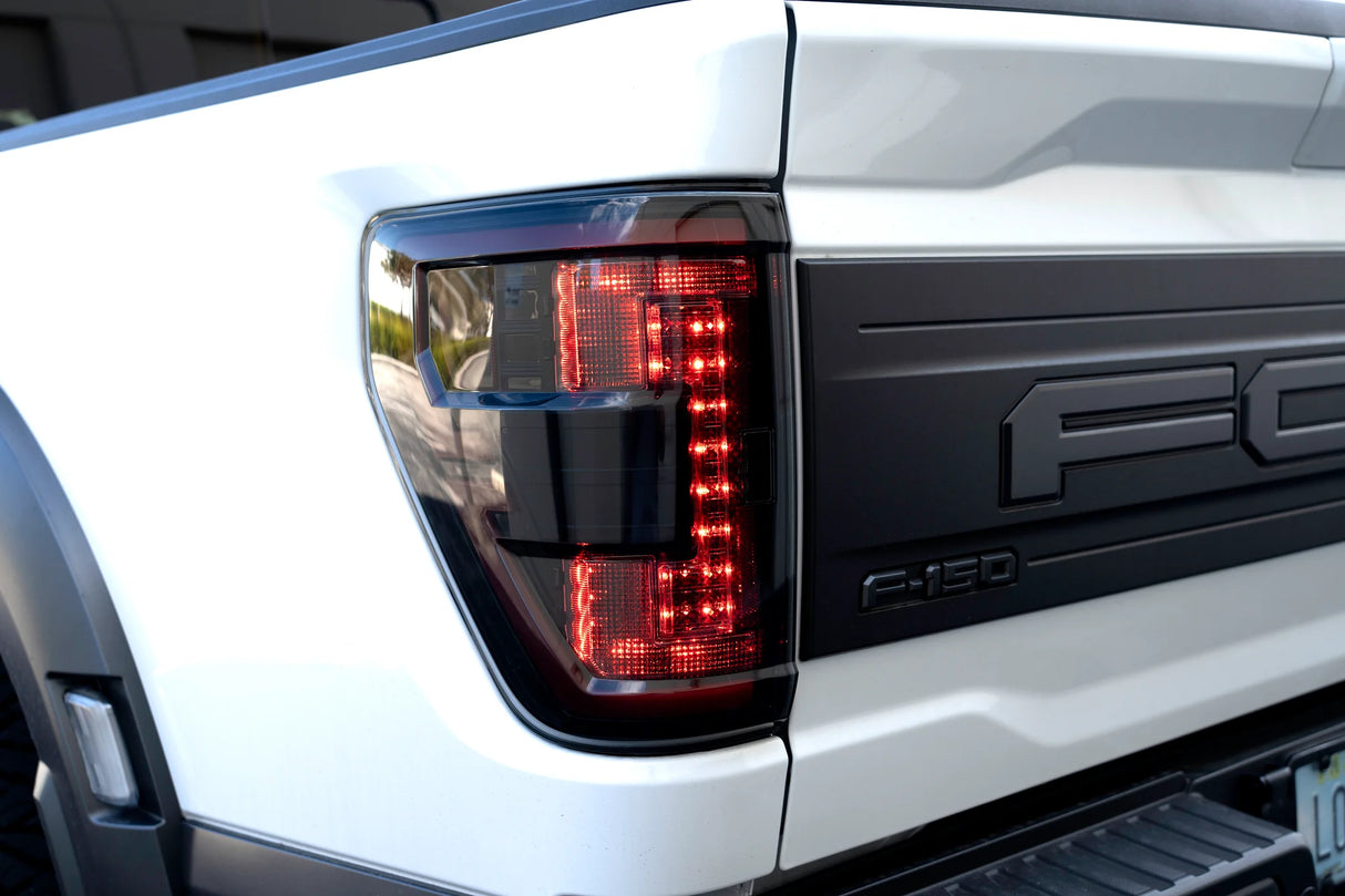 Ford F150 & Ford RAPTOR 21-23 (Attn: This Part ONLY Replaces OEM Factory Installed LED Style Tail Lights w/ Blind Spot Warning System aka BLIS) OLED TAIL LIGHTS - Red Smoked Lens