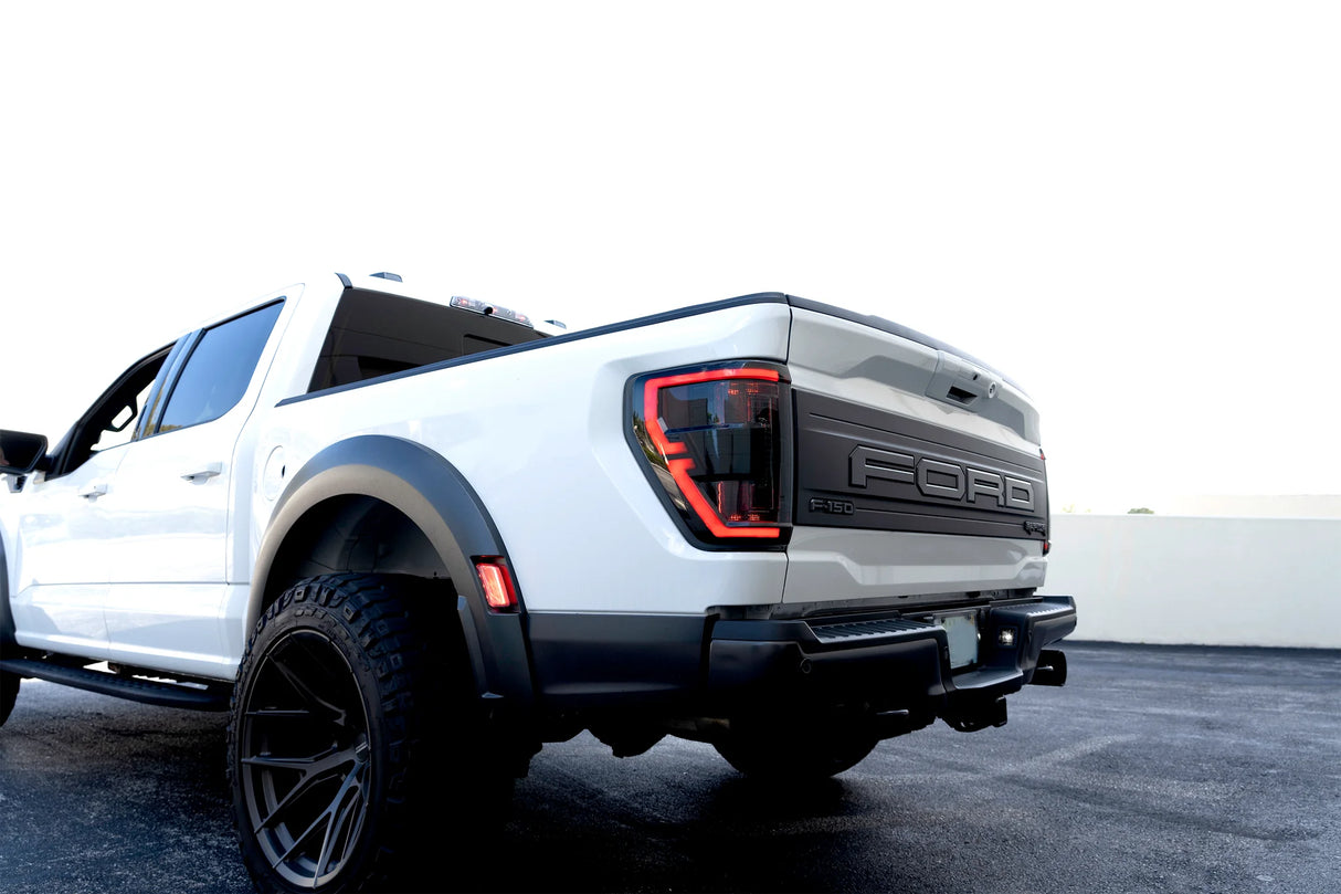 Ford F150 & Ford RAPTOR 21-23 (Attn: This Part ONLY Replaces OEM Factory Installed HALOGEN Style Tail Lights w/ Blind Spot Warning System) Start-Up Light Sequence OLED TAIL LIGHTS - Red Smoked Lens