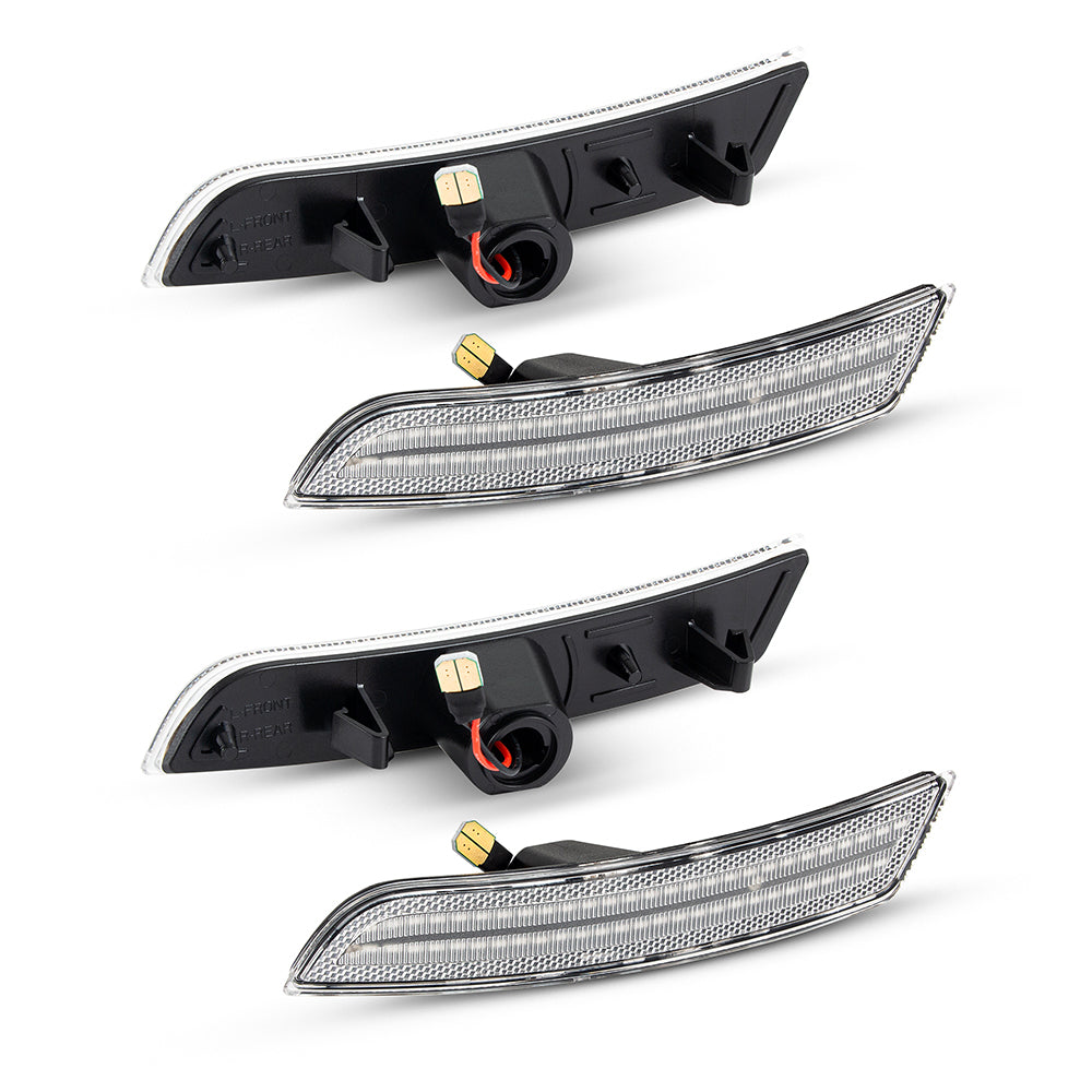 Four car side marker lights on a white background