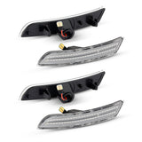 Four car side marker lights on a white background