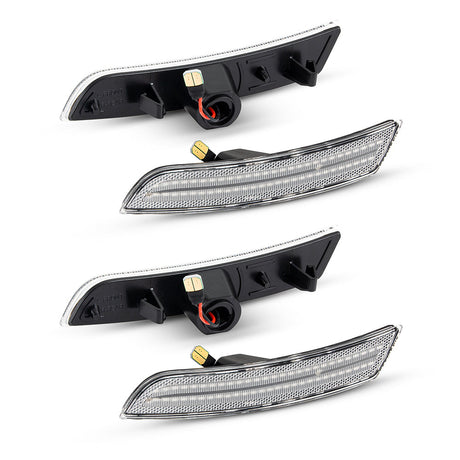 Four car side marker lights on a white background
