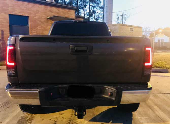 GMC Sierra 07-13 Tail Lights OLED in Dark Red Smoked