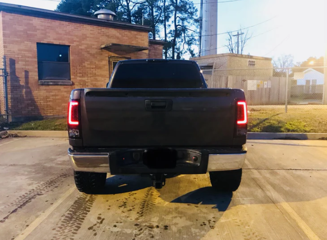 GMC Sierra 07-13 Tail Lights OLED in Dark Red Smoked