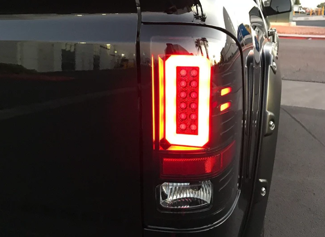 GMC Sierra 1500 16-18 Tail Lights OLED in Dark Red Smoked