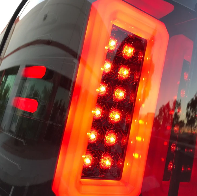 GMC Sierra 1500 16-18 Tail Lights OLED in Dark Red Smoked