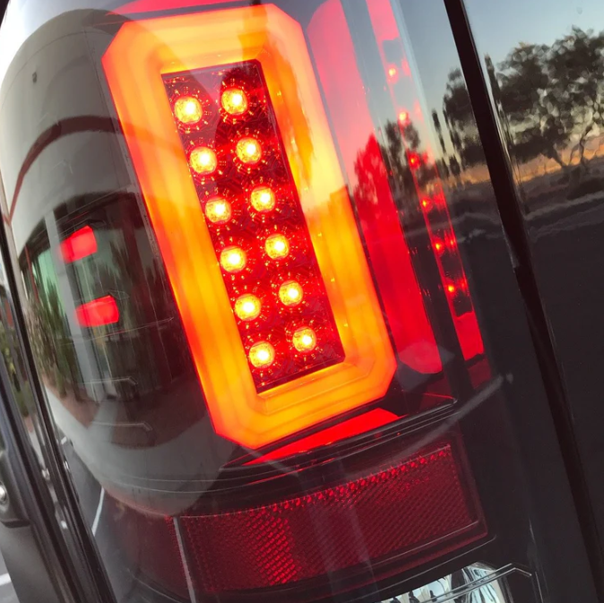 GMC Sierra 1500 16-18 Tail Lights OLED in Dark Red Smoked