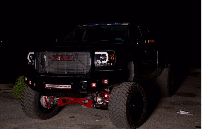 GMC Sierra 3500 15-19 Dually Projector Headlights w OLED Amber DRLs & Scanning OLED Amber Turn Signals in Smoked/Black